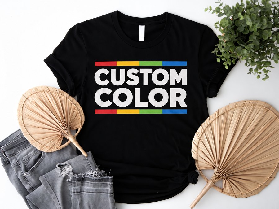 Black t-shirt flat lay printed with the Custom Color logo